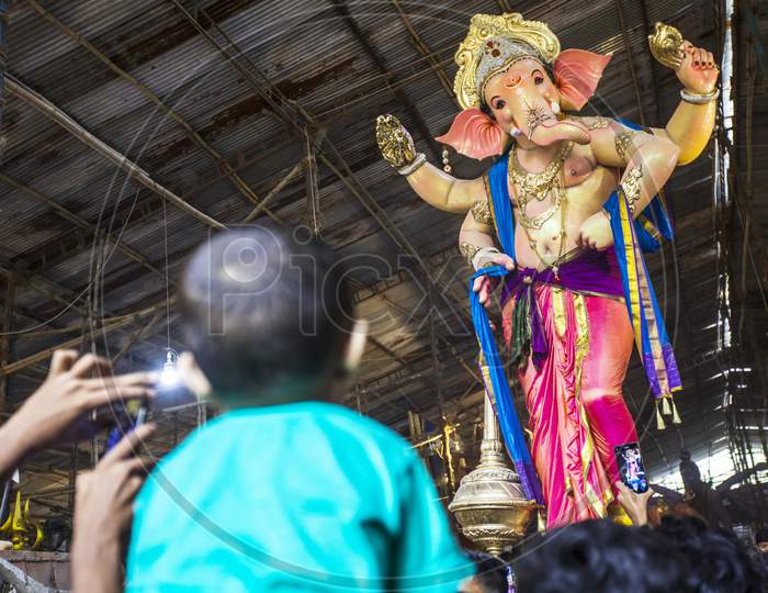 Ganesha idol immersion celebrations with people