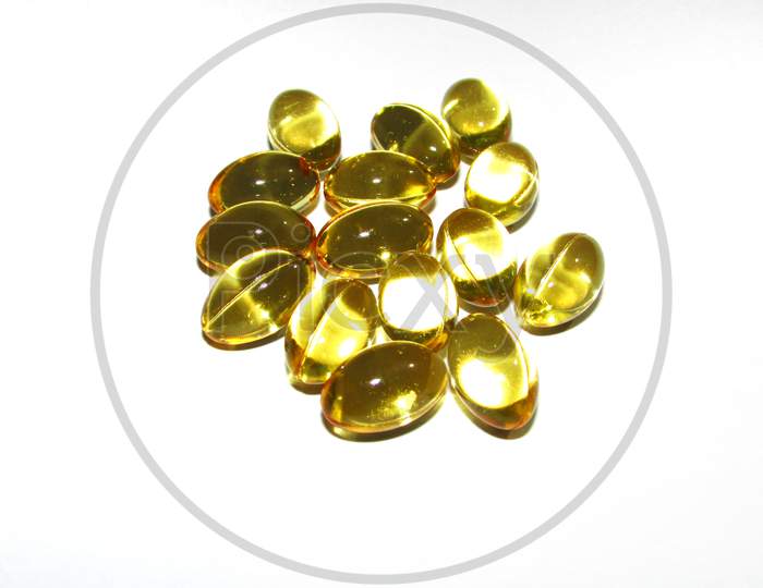 Cod liver oil  or fish oil gel capsules  on white background.