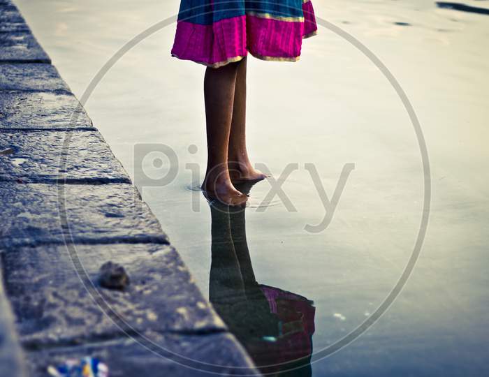girl standing in water