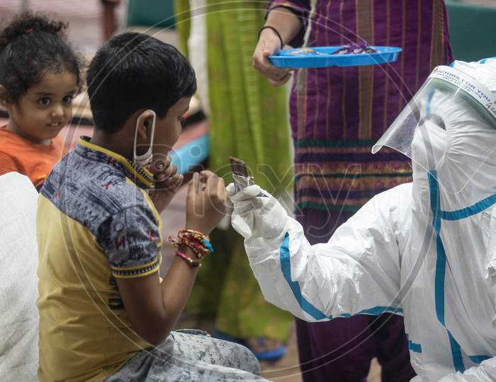 Doctors celebrate Raksha Bandhan festival with patients at a Covid Care Center in CWG complex in New Delhi, India on August 03, 2020.
