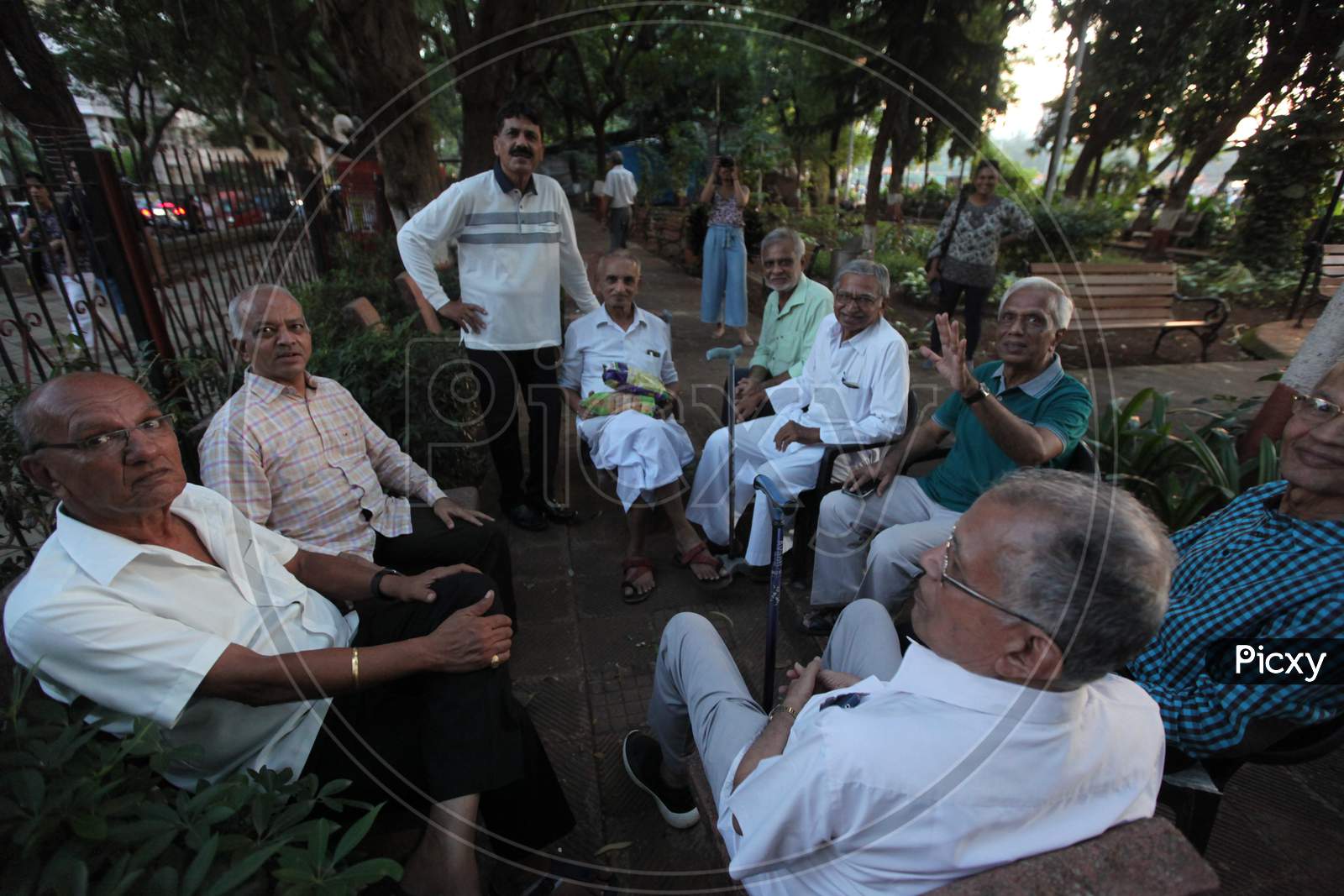 A Group of Old People posing towards the Camera
