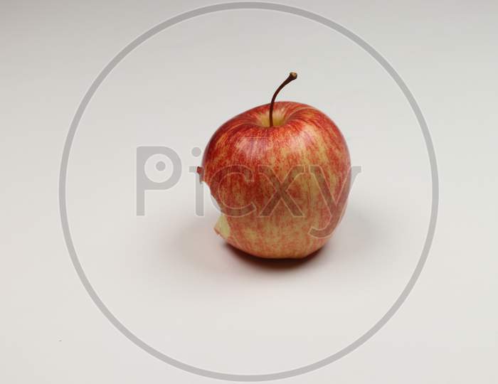 A Bitten Apple Fruit isolated on white background