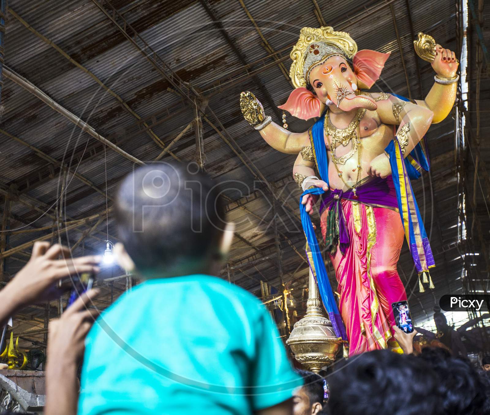 Ganesha idol immersion celebrations with people