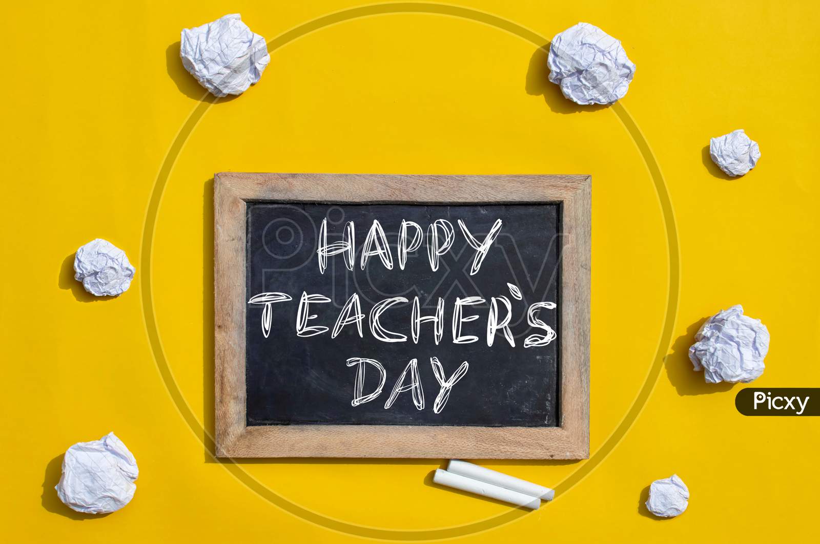 Happy Teacher's Day Creative Photo With Slate Board And Crumpled Paper Balls, Perfect For Wallpaper