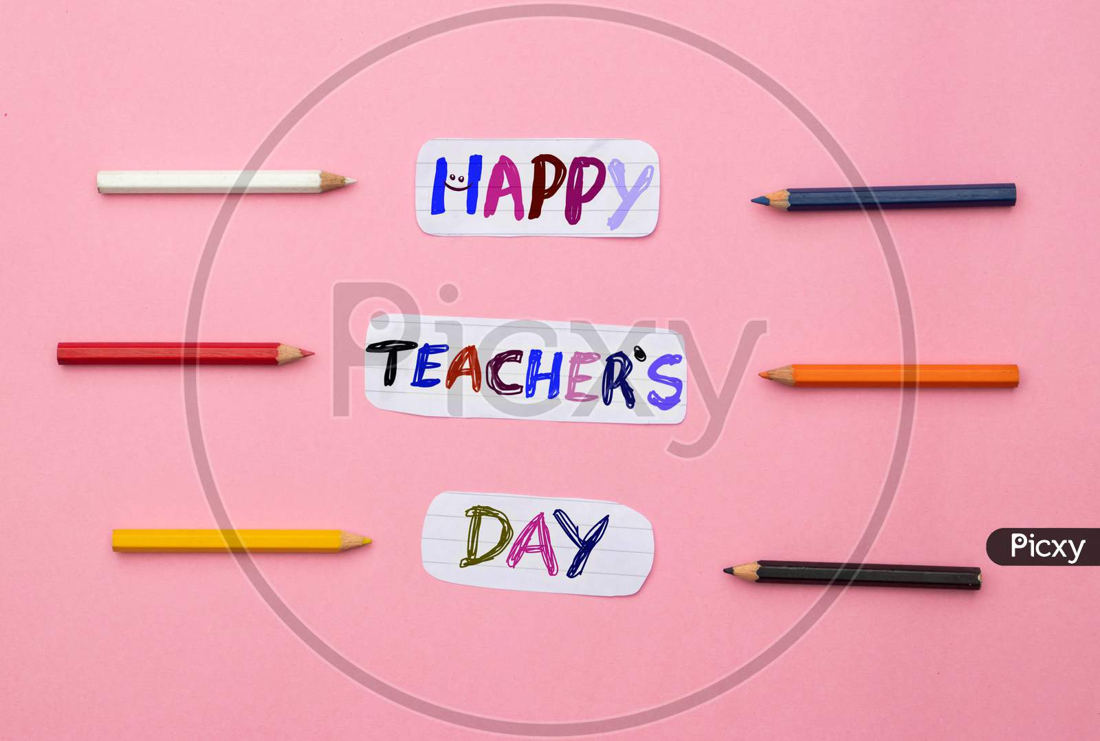 Happy Teacher's Day Conceptual Photo With Color Pencils Isolated On Pink Background, Perfect For Wallpaper