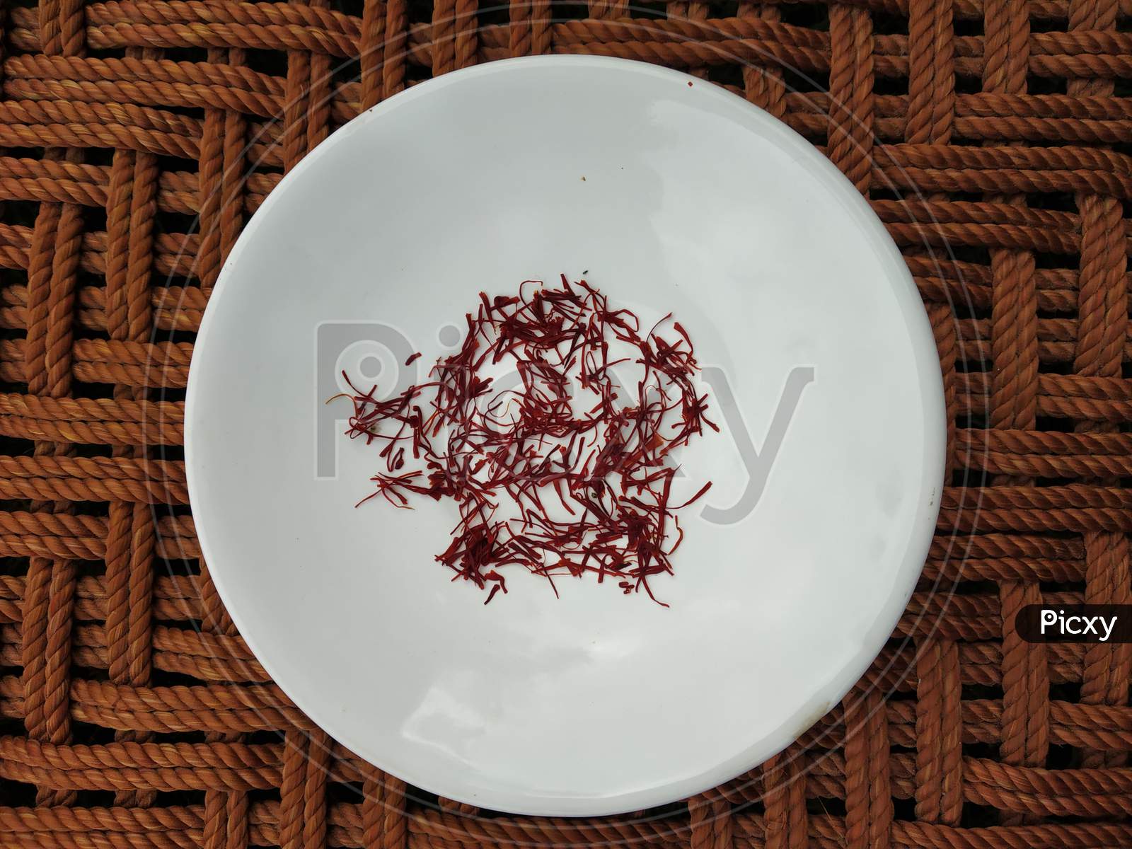 Saffron is decorated in a white plate.