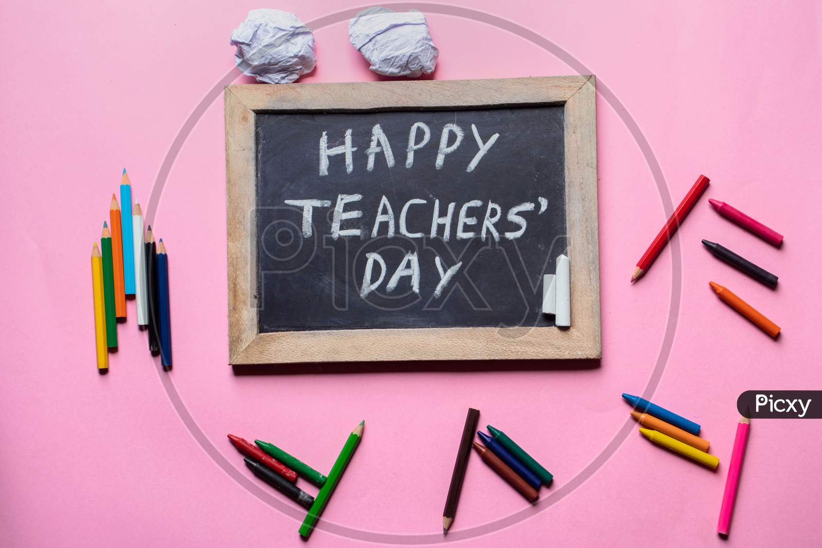 Happy Teacher's Day Creative Photo With Chalkboard And Pencils Isolated On Pink Background, Perfect For Wallpaper
