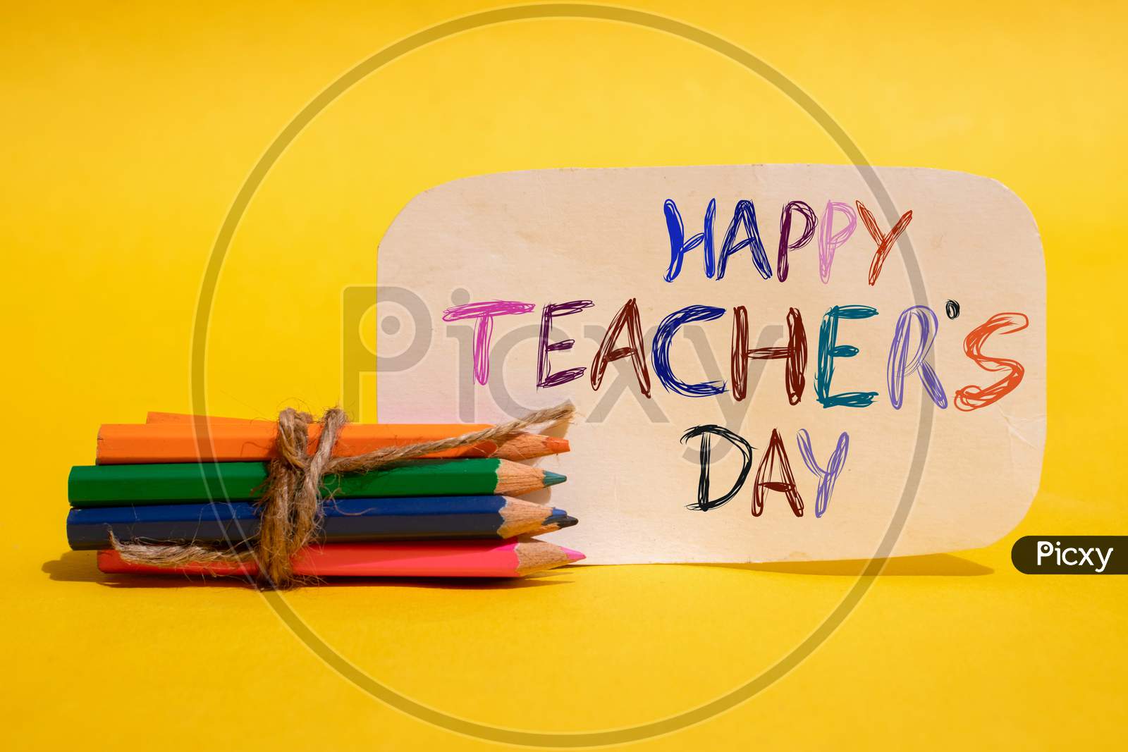 Happy Teacher's Day Written On Paper Note With Color Pencils, Perfect For Wallpaper