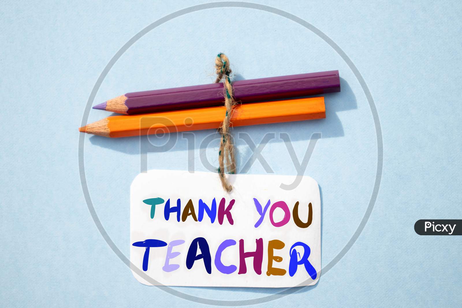 Thank You Teacher Written On Paper Note With Color Pencils, Happy Teacher's Day Conceptual Photo