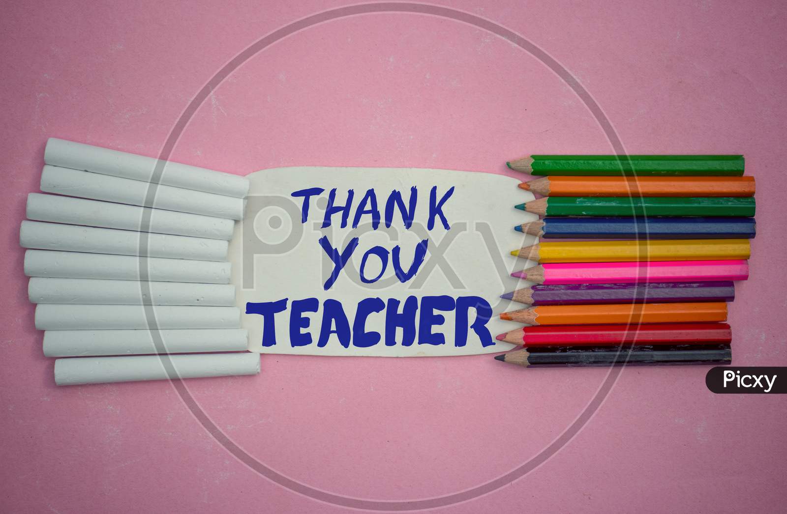 Thank You Teacher Written On Paper Note With Color Pencils And White Chalk, Happy Teacher's Day Conceptual Photo