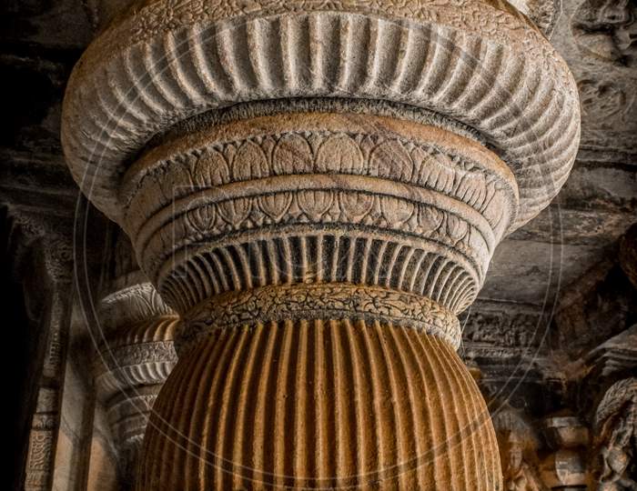 Ancient Indian stone pillar carved design in badami , Karnataka.