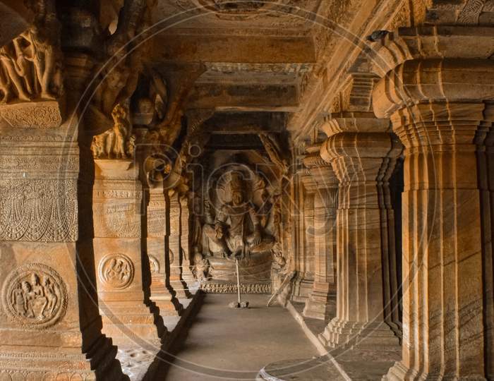 Row of stone pillars having ancient architectural carvings in badami, Karnataka.
