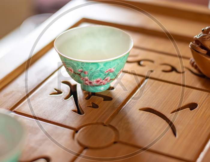 Chinese Porcelain Tea Cup On The Table, Chinese Tea Set