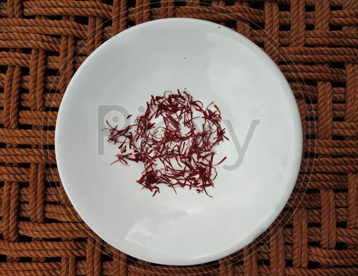 Saffron is decorated in a white plate.