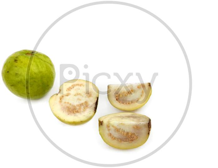 Guava amrud cut slices green fresh and juicy fully ripen  indian seasonal fruit on Isolated white background , Selective Focus.