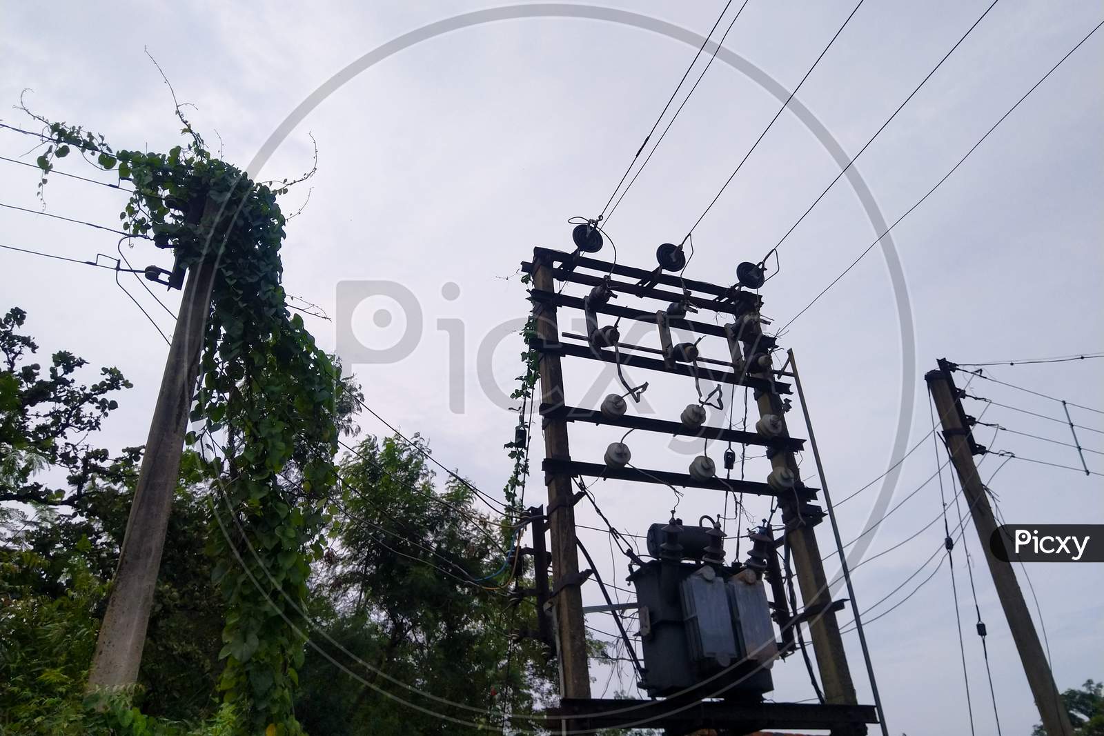 Electric Transformer & Pole On A Cloudy Day Selective Focus