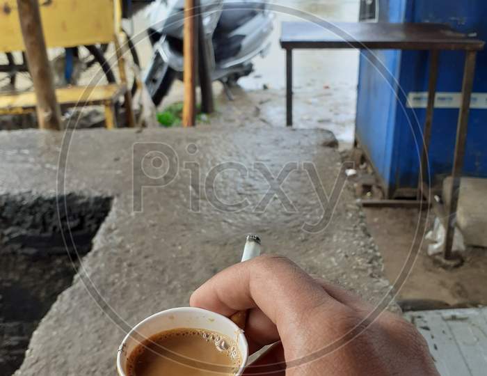 Moonsoon with tea and cigarette