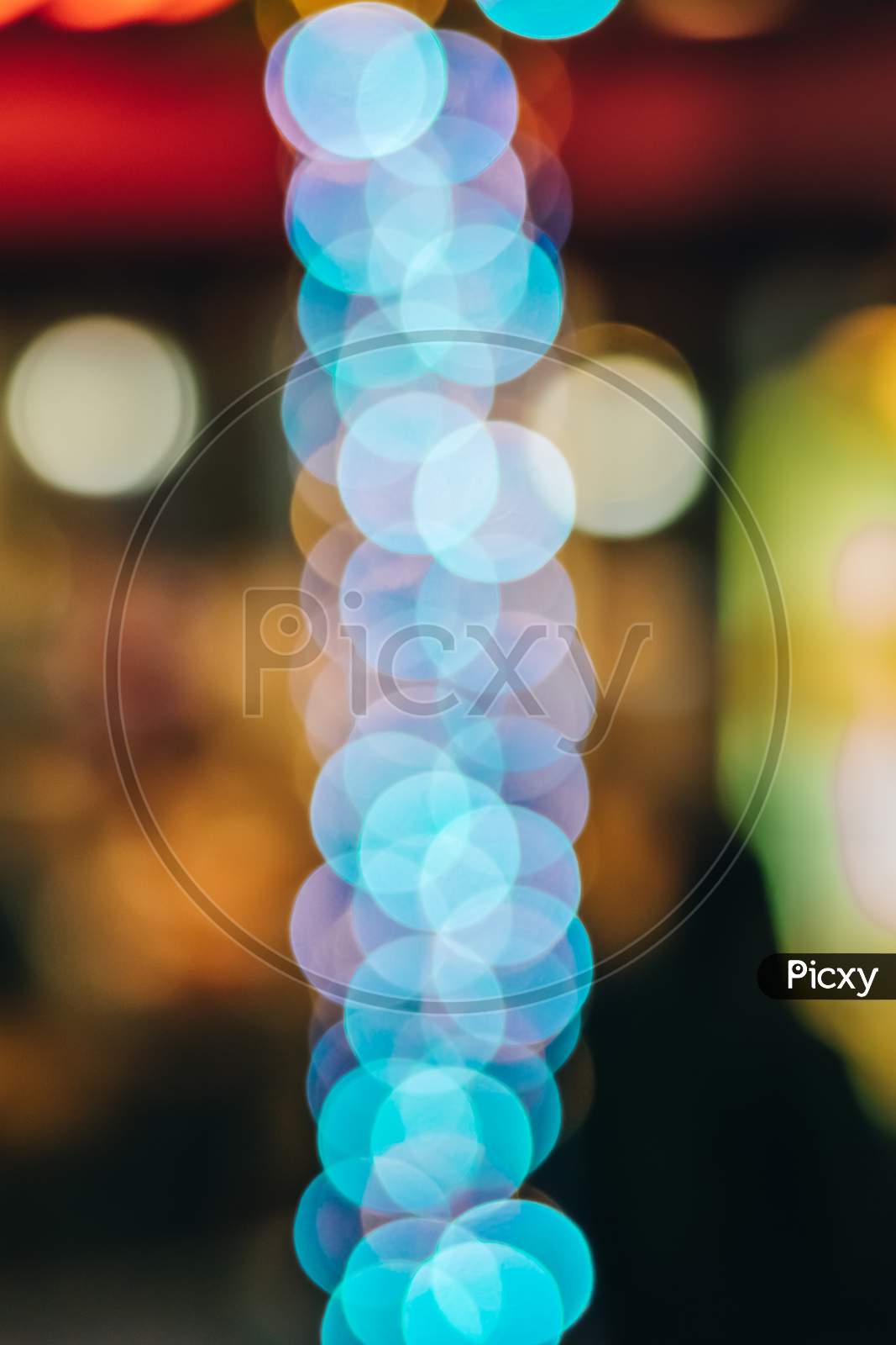 Unfocused Abstract Bokeh. Defocused And Blurred Many Round Light.