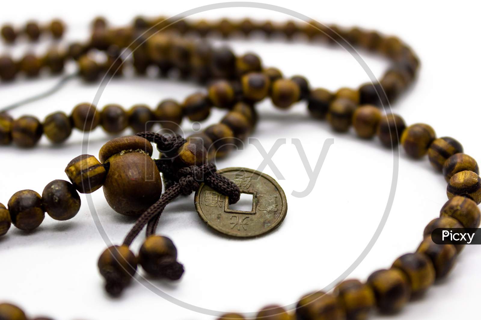 Round Beads With Locket Representing Buddhist Hindu Religion Philosophy From Asian Countries