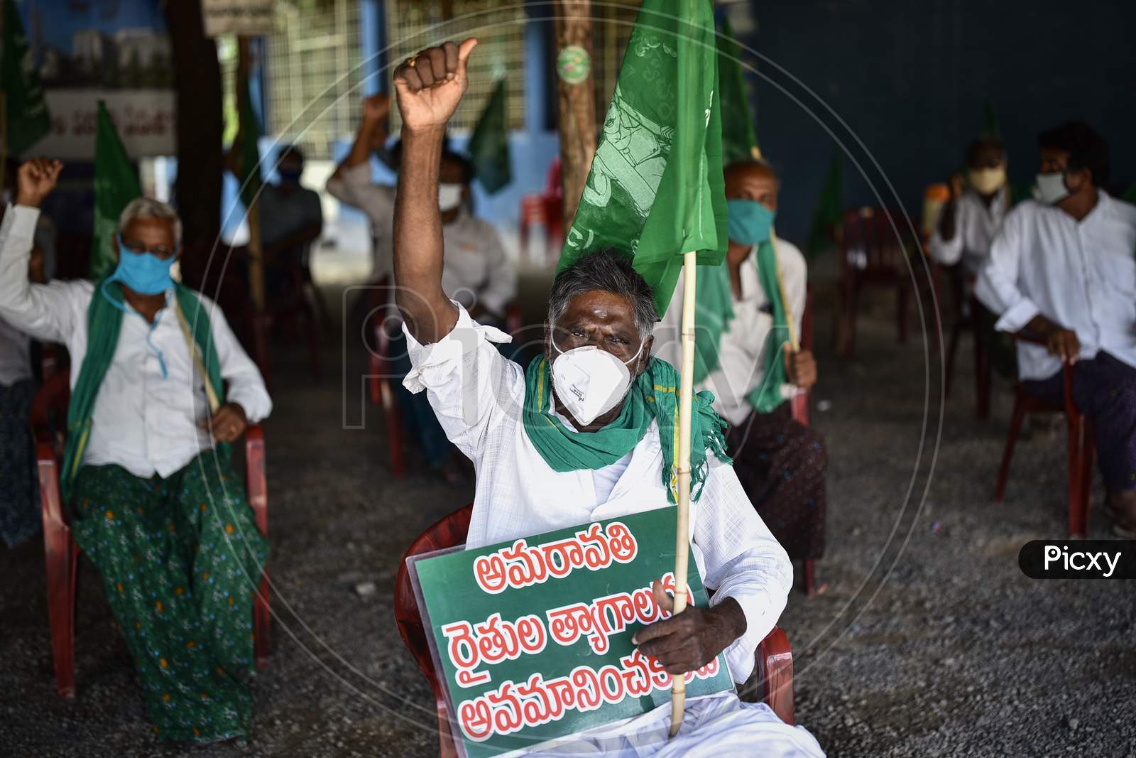 Farmers Hold Placards As They Protest Against Governor Biswabhusan Harichandan's Approval For Three Capitals For The State Of Andhra Pradesh, At Velagapudi In Guntur District, August 02, 2020.