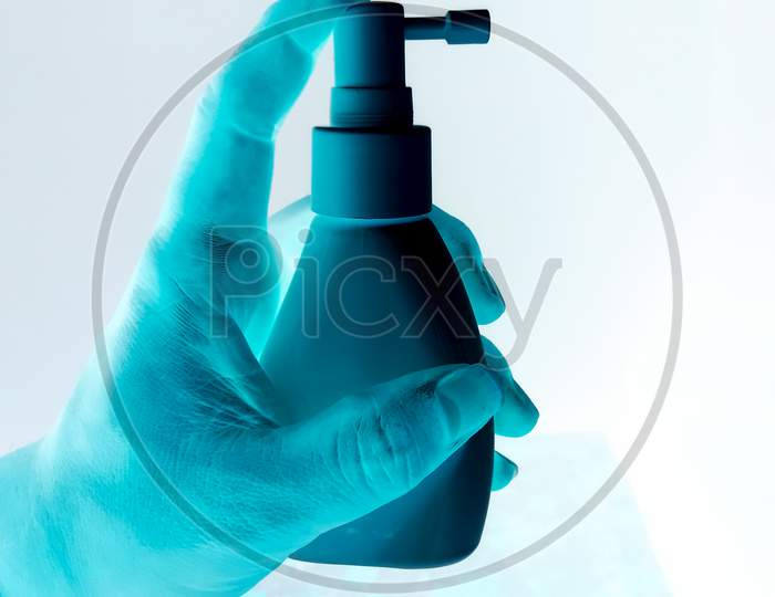Sanitizer spray bottle in ultra violet