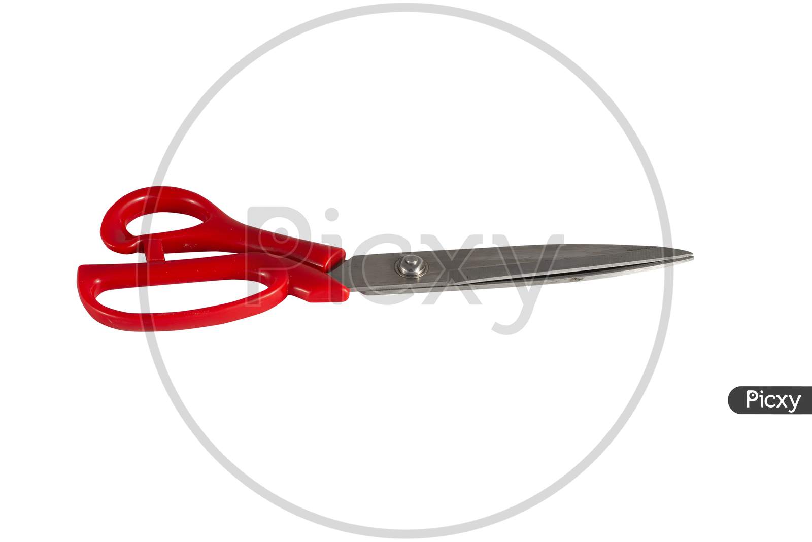 Scissors with red handle isolated on white background