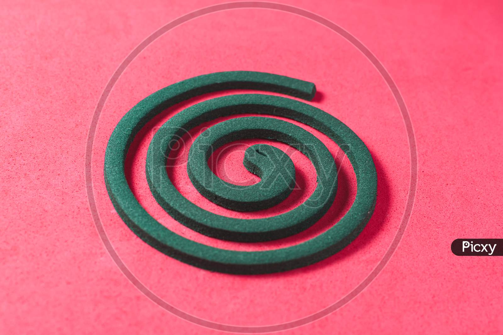 Mosquito Coil On A Red Background
