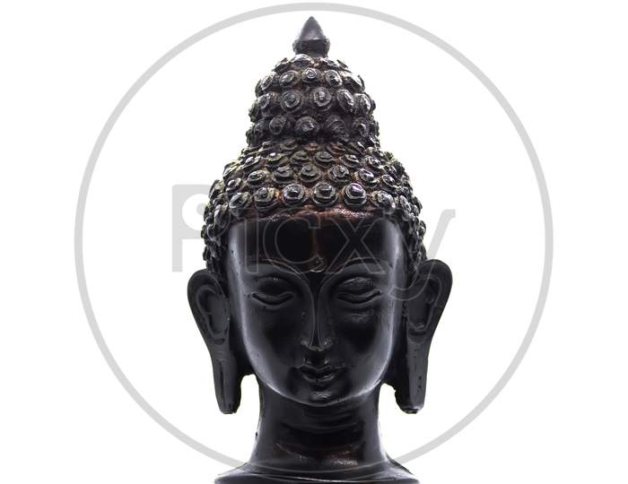 An Abstract Art Containing Close Up Of Black Buddha Sculpture Against White Background