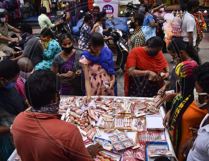 Women Buy Rakhis On The Eve Of Raksha Bandhan Festival, In Vijayawada, August 02, 2020.