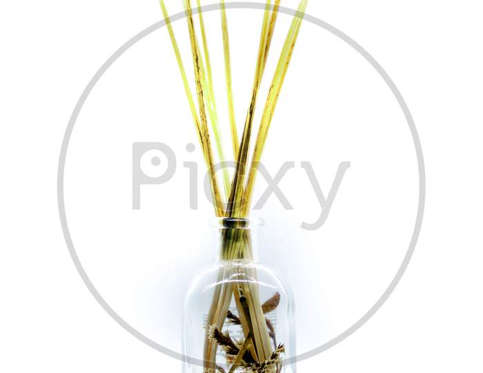 Close Up Of An Object With Wood Sticks In Liquid For Home Fragrance Or No Fire Aroma Diffuser With Sticks