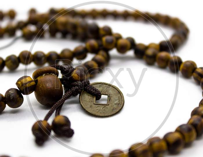 Round Beads With Locket Representing Buddhist Hindu Religion Philosophy From Asian Countries