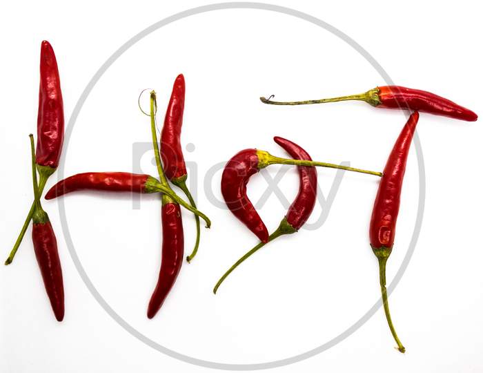 Red Small Chillies Sticking Together To Form A Word Hot In Terms Of Spiciness