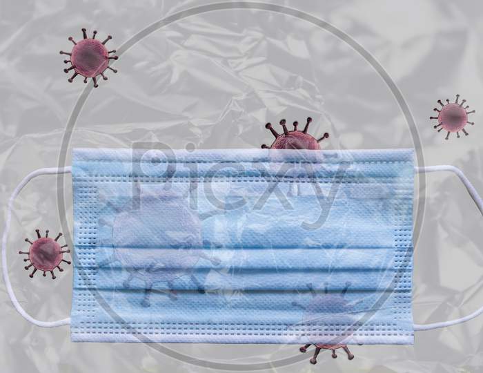 Medical corona virus mask behind plastic film with the corona virus on and around it