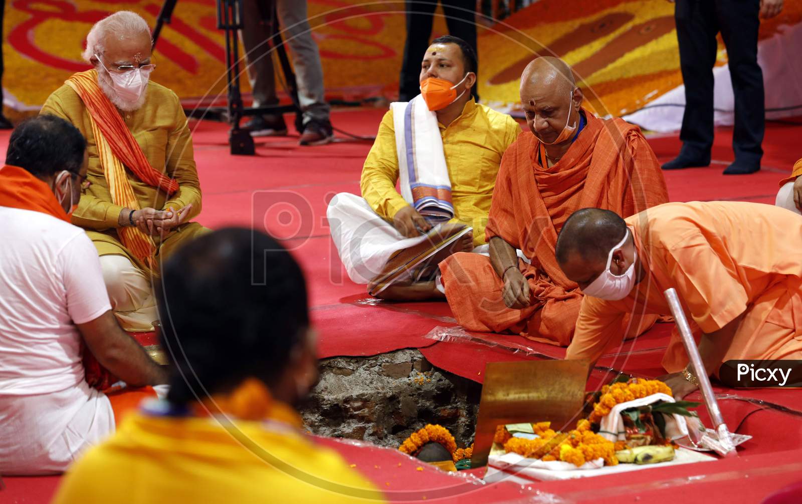 Prime Minister Narendra Modi and Uttar Pradesh Chief Minister Yogi Adityanath perform rituals during the foundation laying ceremony for the Hindu Lord Ram's temple, in Ayodhya, India, August 5, 2020.