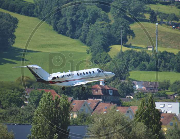 Cessna Citation CJ2 is departing from the airport Saint Gallen Altenrhein in Switzerland 10.7.2020