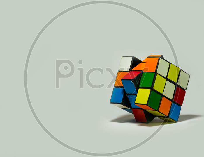 Rubik'S Cube Placed Diagonally On A White Background