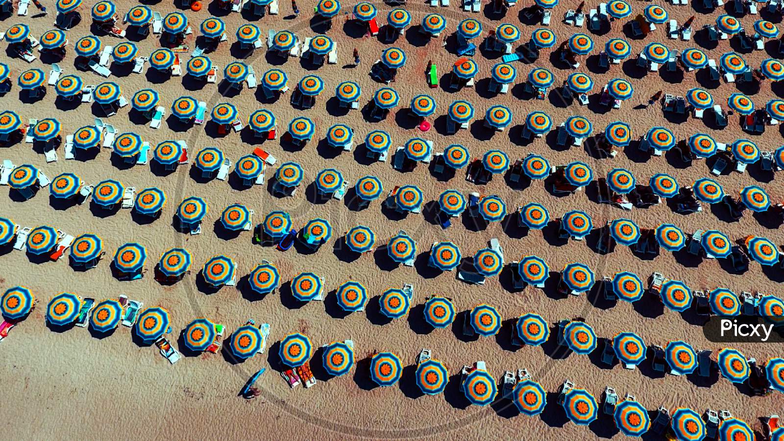 Umbrellas On beach drone view
