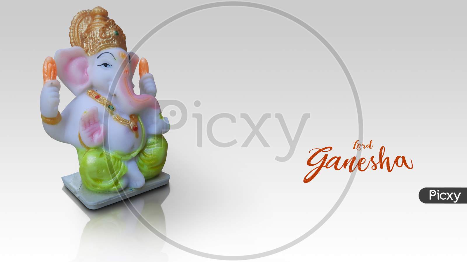 Lord Ganesha Idol Isolated In White Background