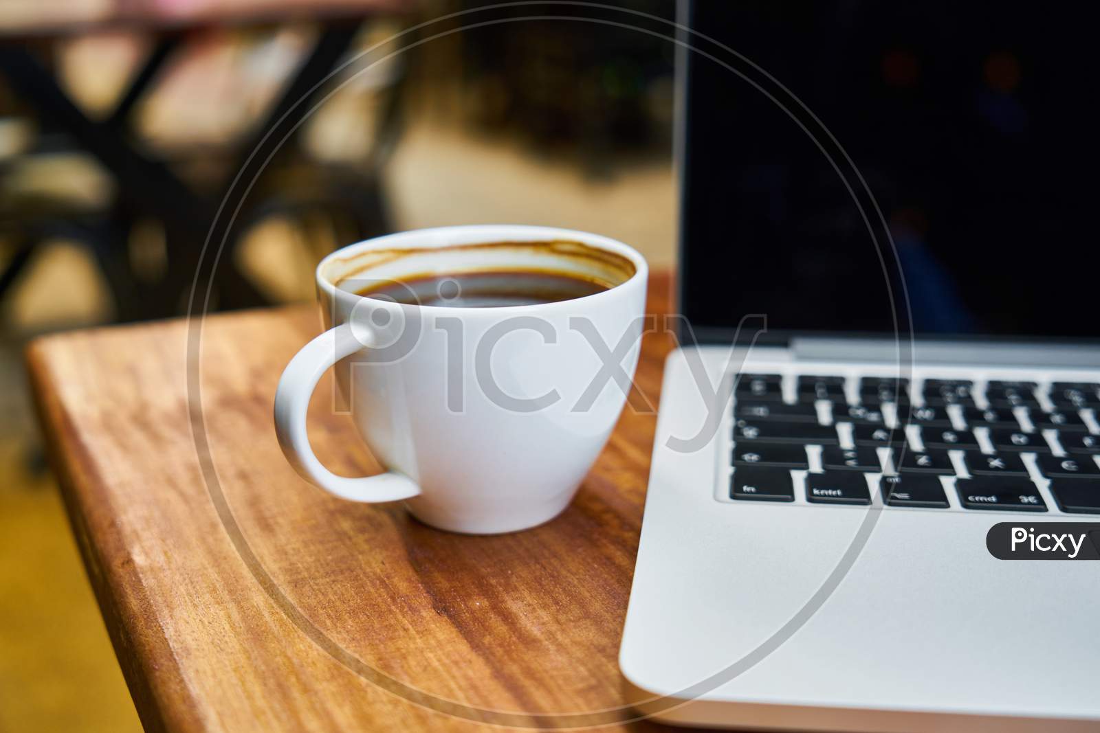 hot coffee with laptop