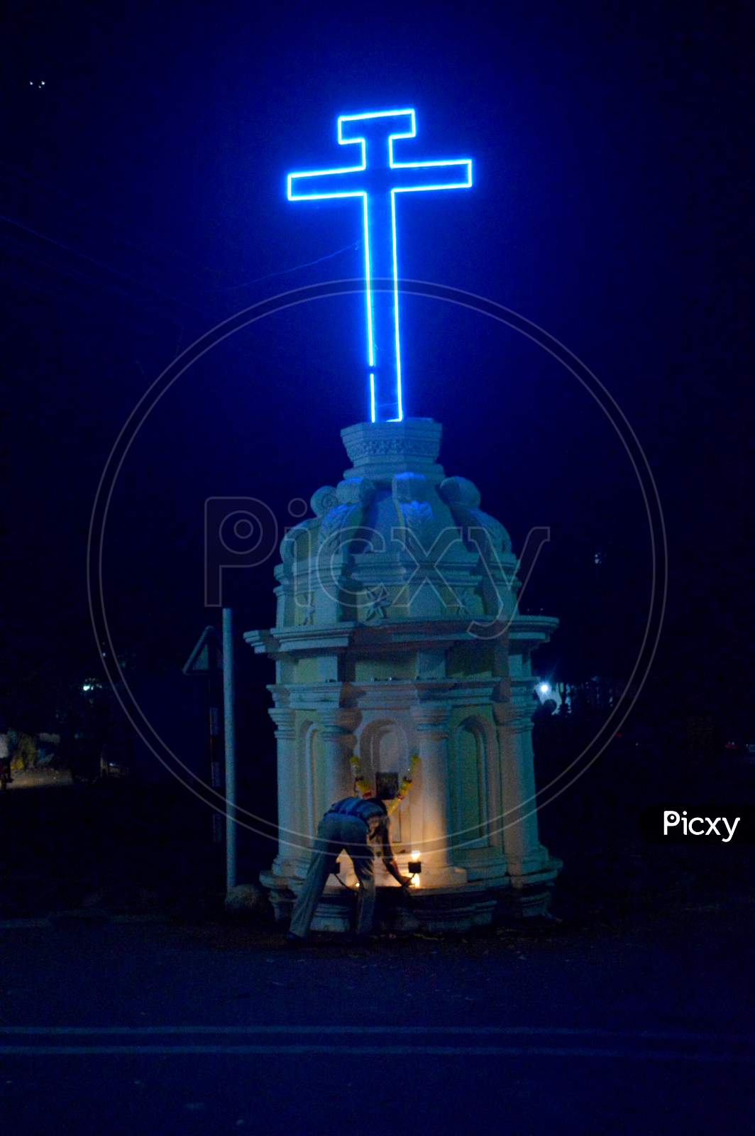 Image Of Neon Cross Man Lighting Candle Rt421538 Picxy 