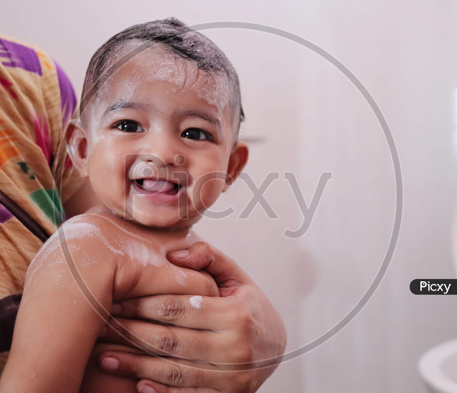 Indian Baby Enjoying Bubble Bath With Foam