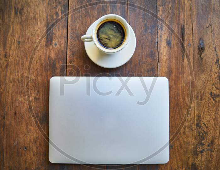 hot coffee with laptop