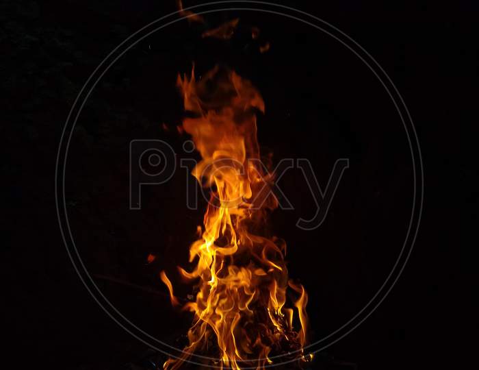 Yellow flames on black background