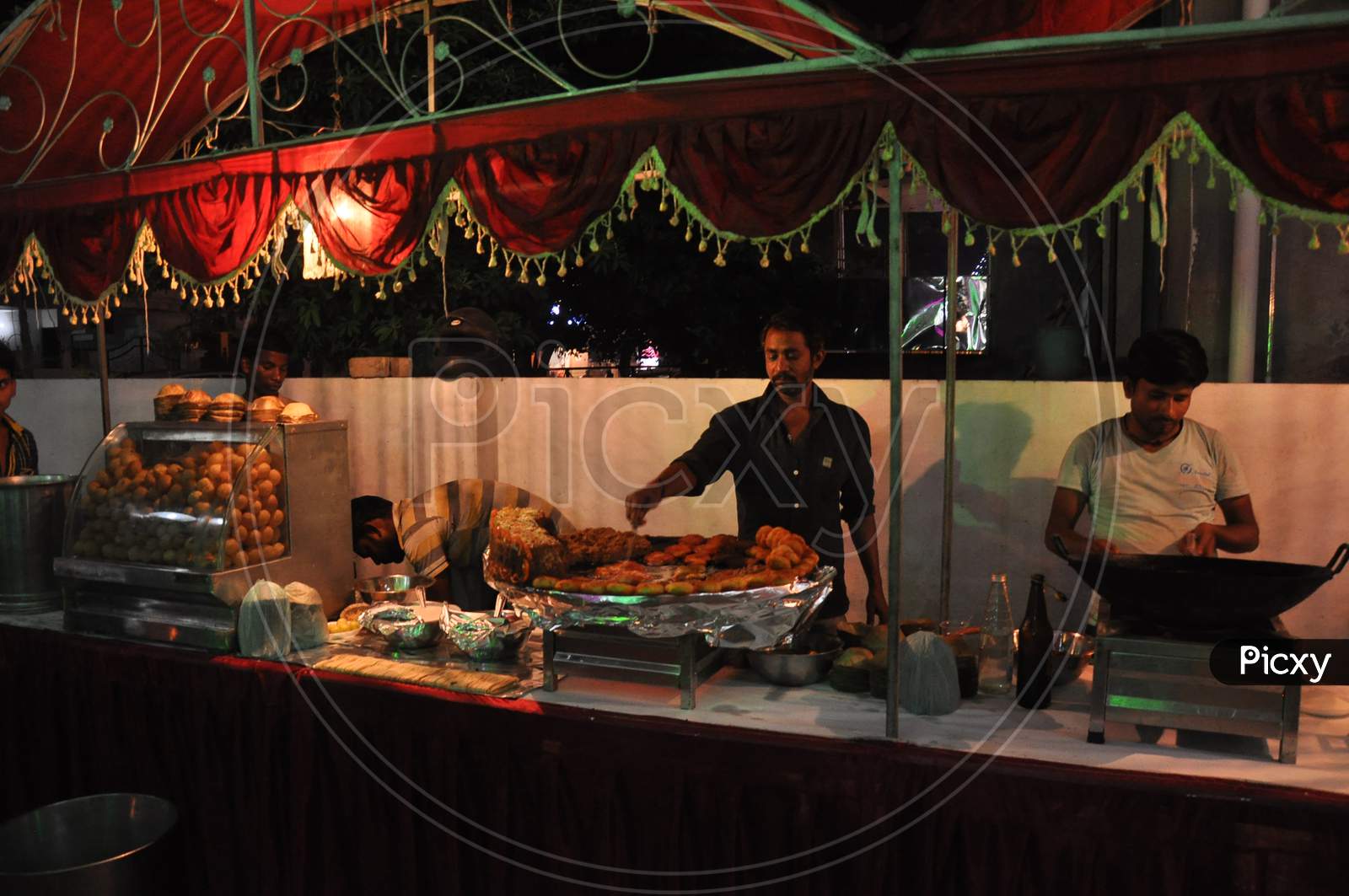 A street food vendor making Aaloo Chaat - An Indian street food