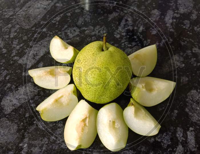 Whole Pears Slices Arranged In A Flower Shape
