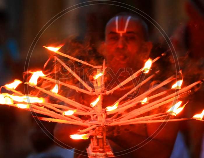Hindu Priest performing ''Maha Aarti'' as they celebrate groundbreaking ceremony of the proposed Ram Temple, in Ayodhya, at the Holy lake In Pushkar, On August 5, 2020.