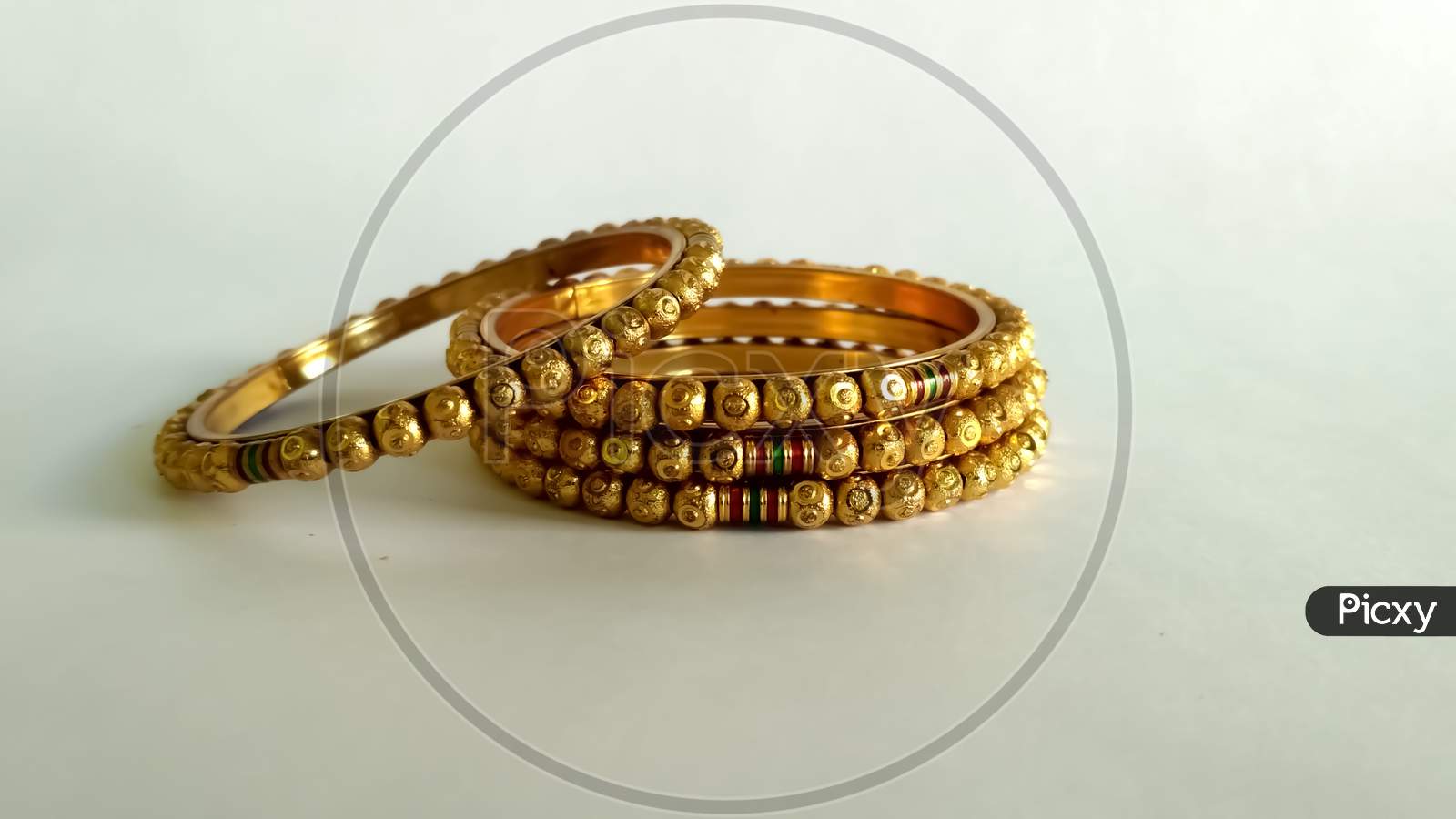 Attractive Golden Glass Bangles in Indian Traditional Day Decoration Bracelets