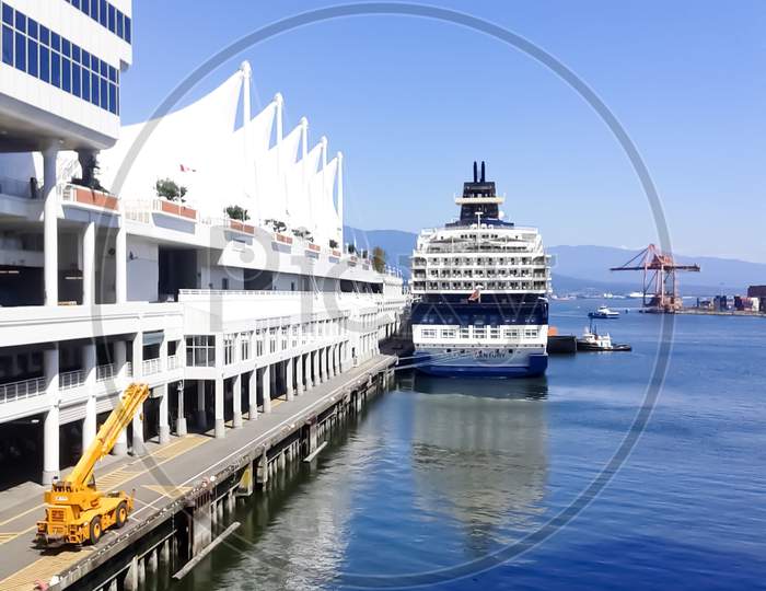 8/3/2014. Vancouver ,Canada .View Of Port Of Vancouver And Celebrity Century Docked In Port ,Clam Blue Sky And Ocean