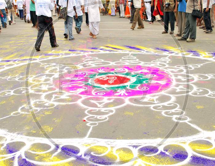 colourful rangoli making on street during kolkata rathayatra festival