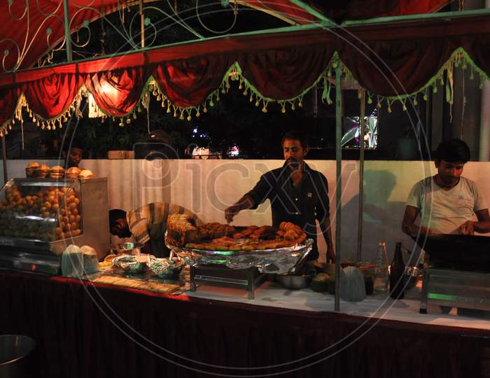 A street food vendor making Aaloo Chaat - An Indian street food